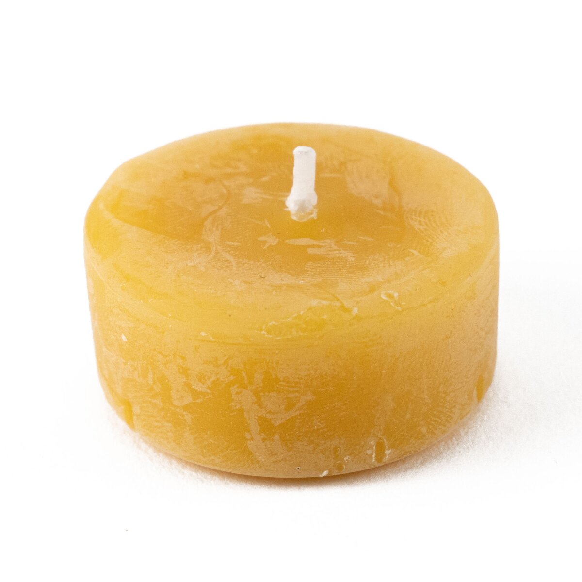 Candela tealight in cera dapi