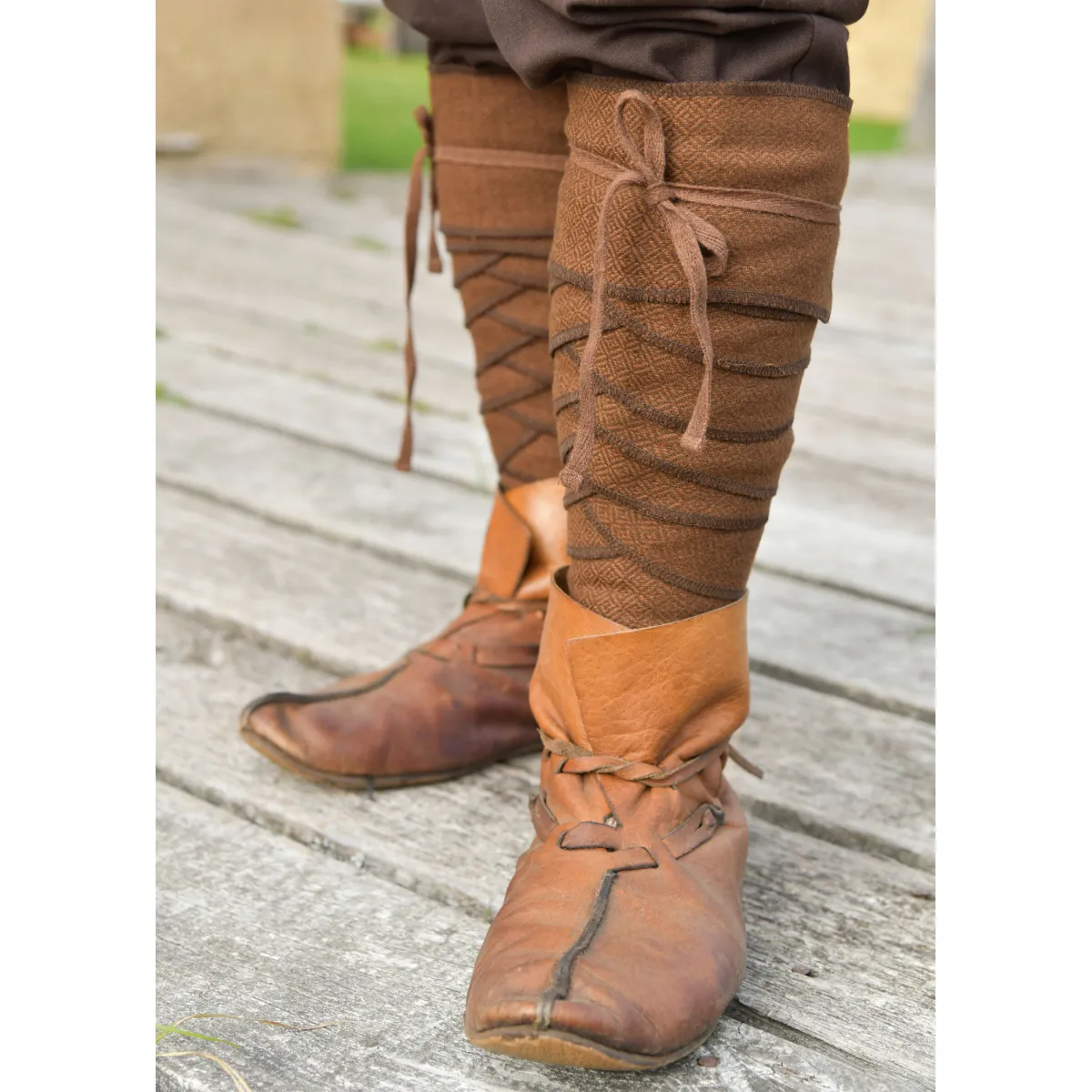 Brown, artfully wrapped calf wraps
