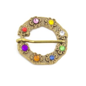 Late medieval brooch with colored glass stones